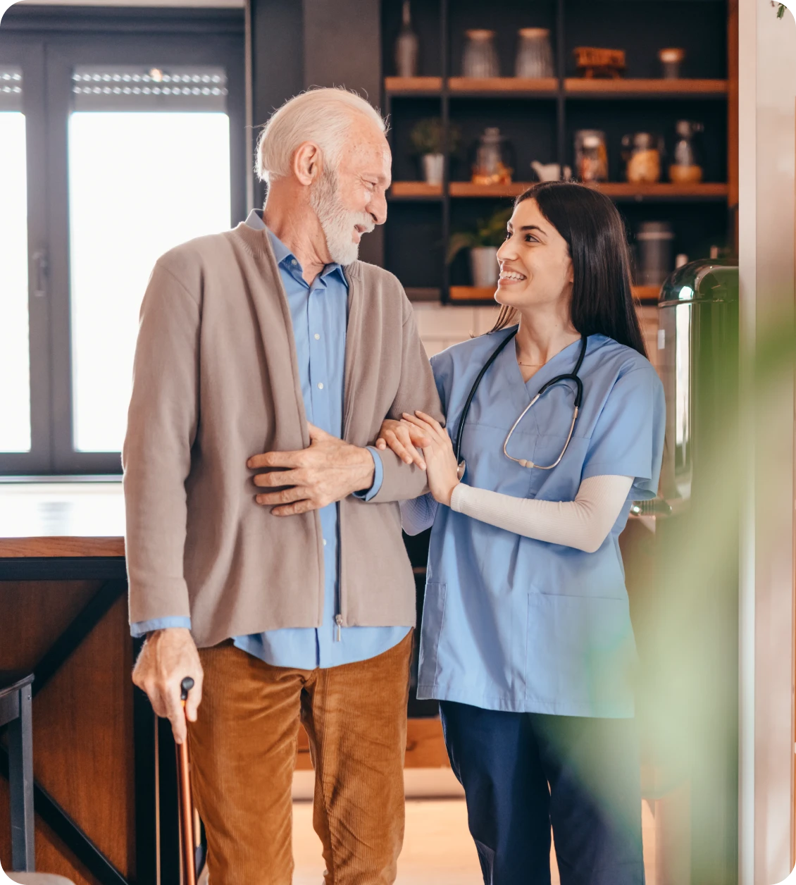 Caregiver assisting senior man